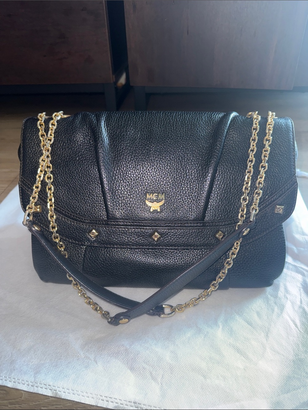 MCM Black Pebbled Leather Shoulder Bag with Gold Hardware and Chain Strap